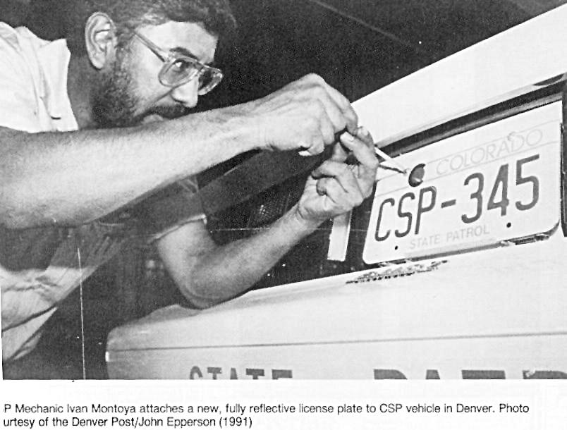 Colorado license plate being attached on car image