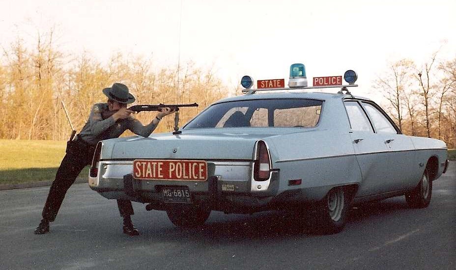 Connecticut police car and officer shooting image