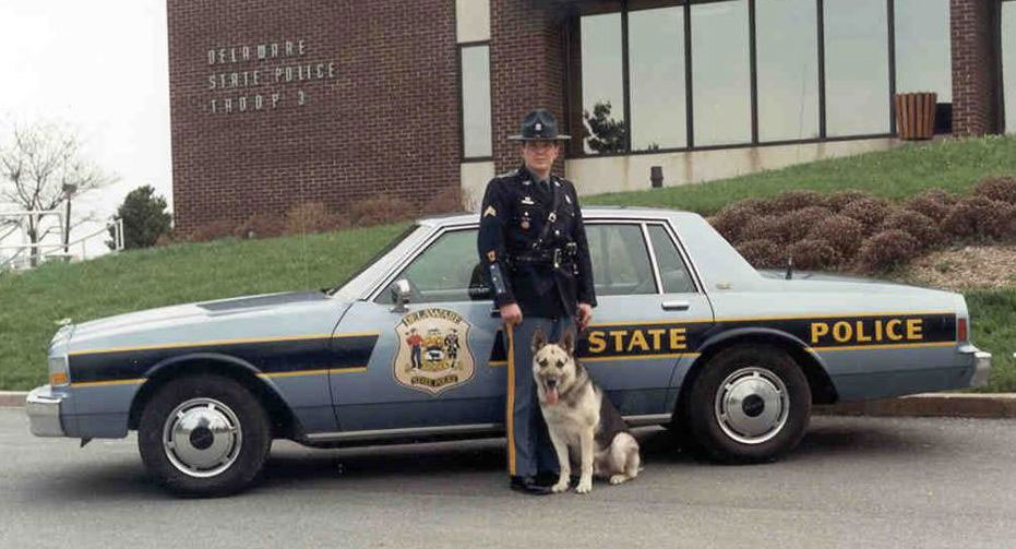 Delaware police car, officer and canine