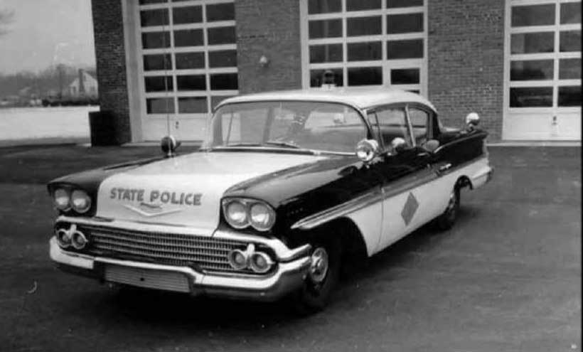 Delaware police car and officers