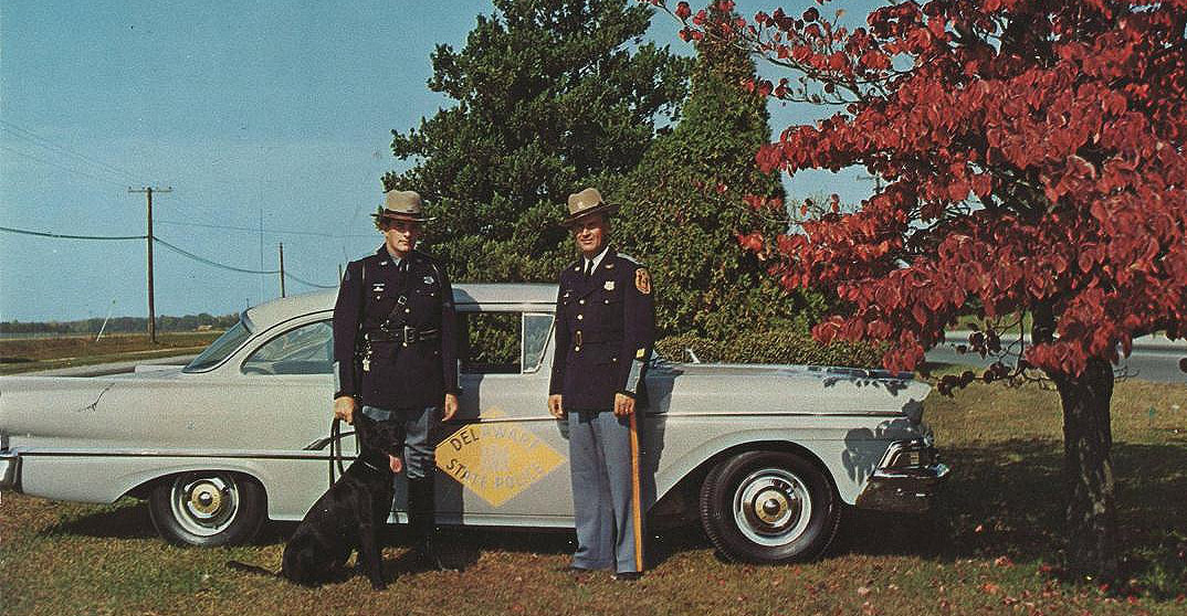 Delaware police car and officers