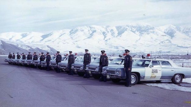Idaho state police car and officers
