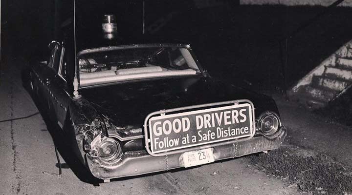 Maine police car with sign