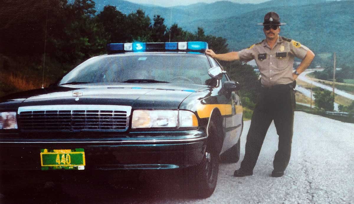 Vermont  police car and Russ officer