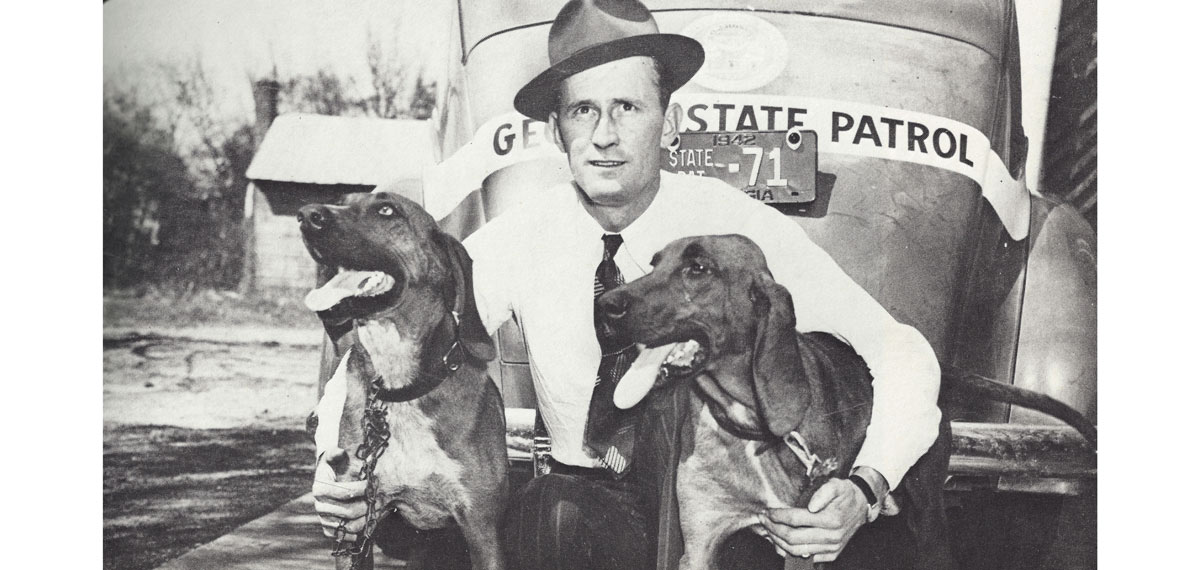 Georgia State patrol car, officer and dogs