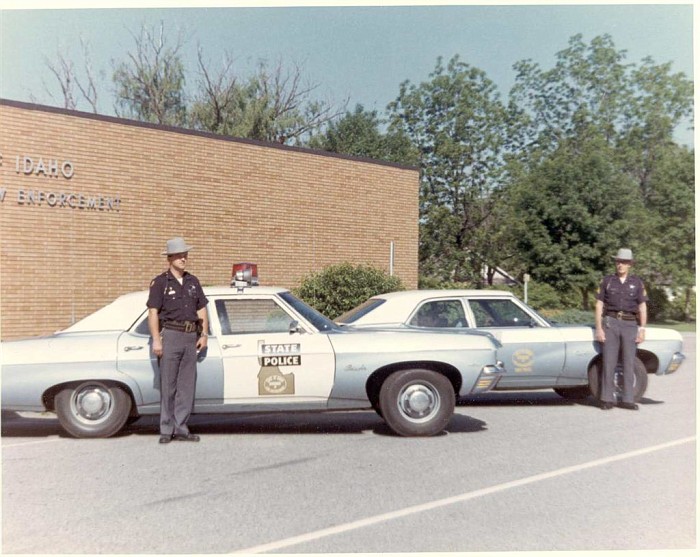 Idaho state police car and officers