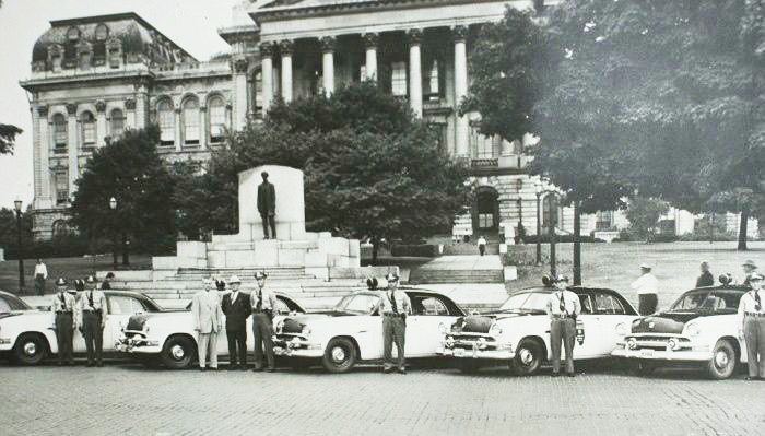 Illinois state police cars and officers