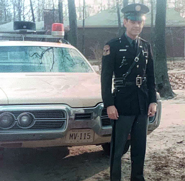 New Jersey officer and police car